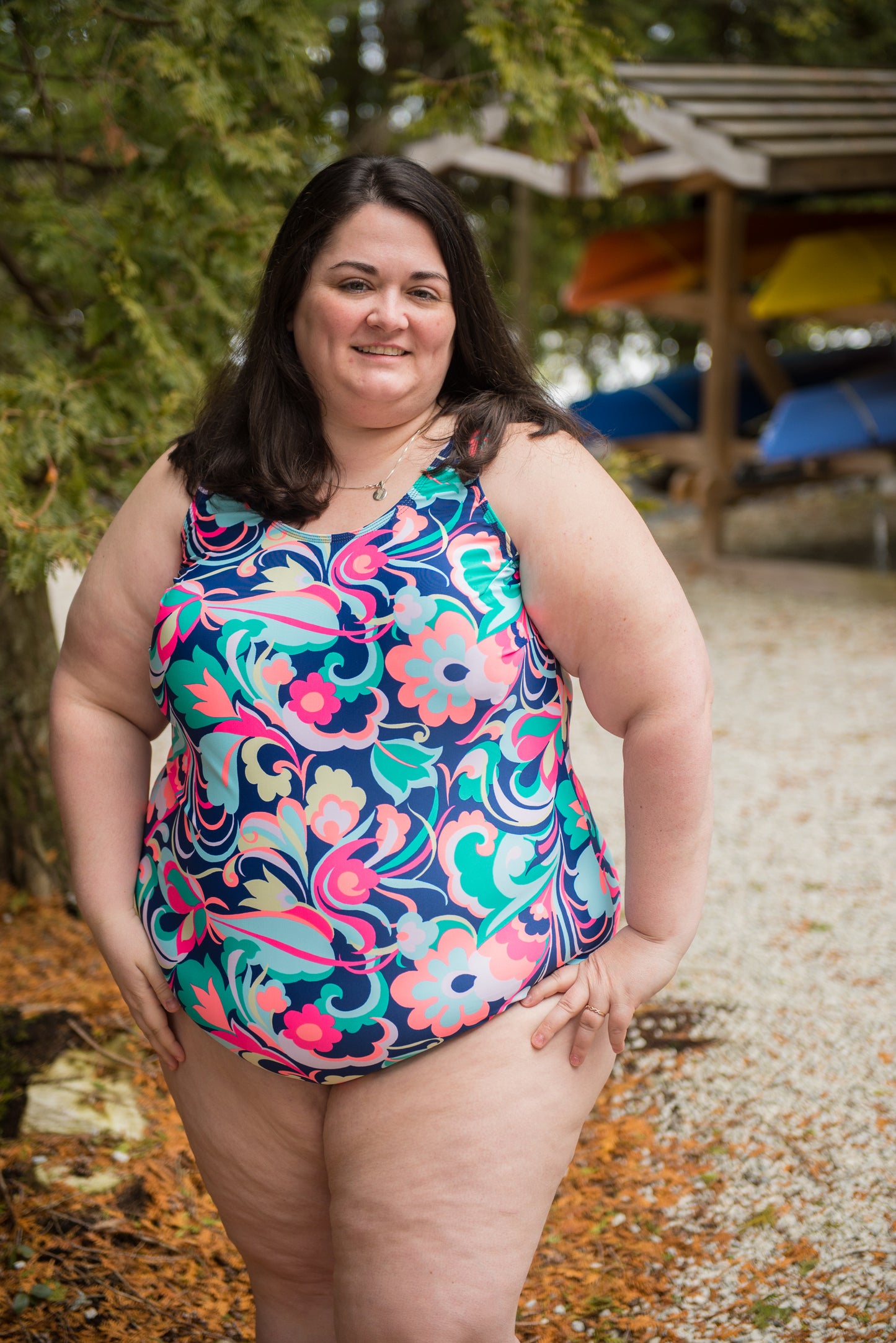 Photo of plus-size woman floral wearing DIBY Club Amelia One-Piece Swimsuit