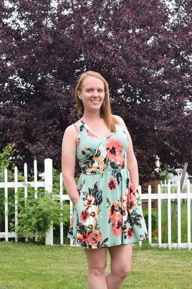 Misses size sleeveless Emmeline with v-neck, pockets, and mini skirt. 