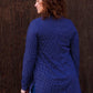 Back view of the Nora with long sleeves and split hem. 