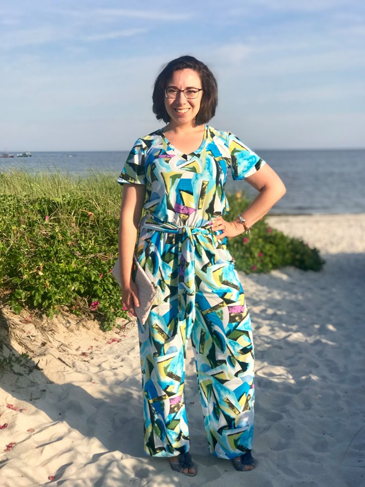 Stevie jumpsuit in misses size in a colorful geometric print. Features short sleeves, tie waist, and wide leg pattern options. 