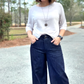 Diana Austin models her Hedy Pants. Double button fly with wide leg denim. 