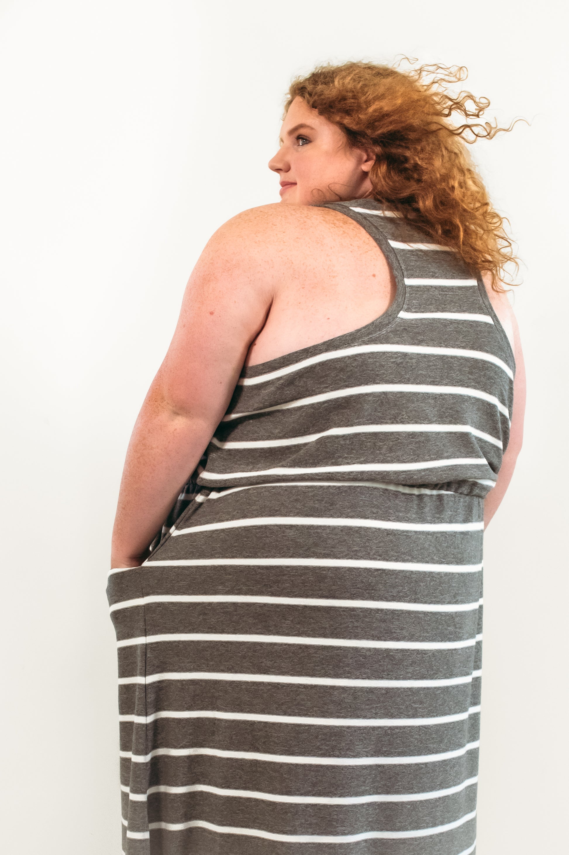 Back view of the Helen Dress in plus size. Features racerback bodice and pockets. 