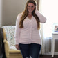 The Grace Cardigan in jacket length with long sleeves. Features buttons. 