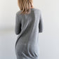 Back view of the Nora Sweater with long sleeves and banded hem. Misses size. 