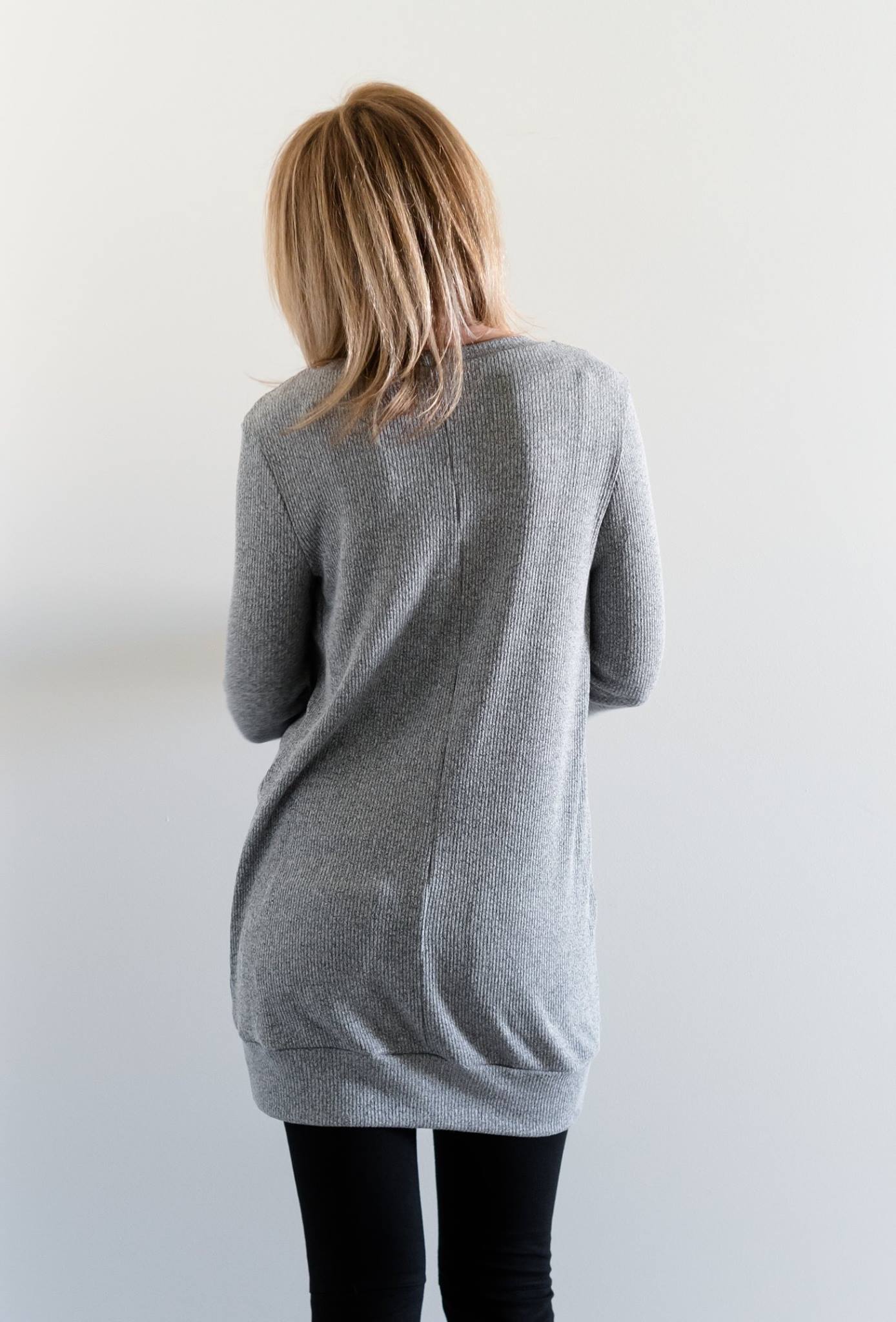 Back view of the Nora Sweater with long sleeves and banded hem. Misses size. 