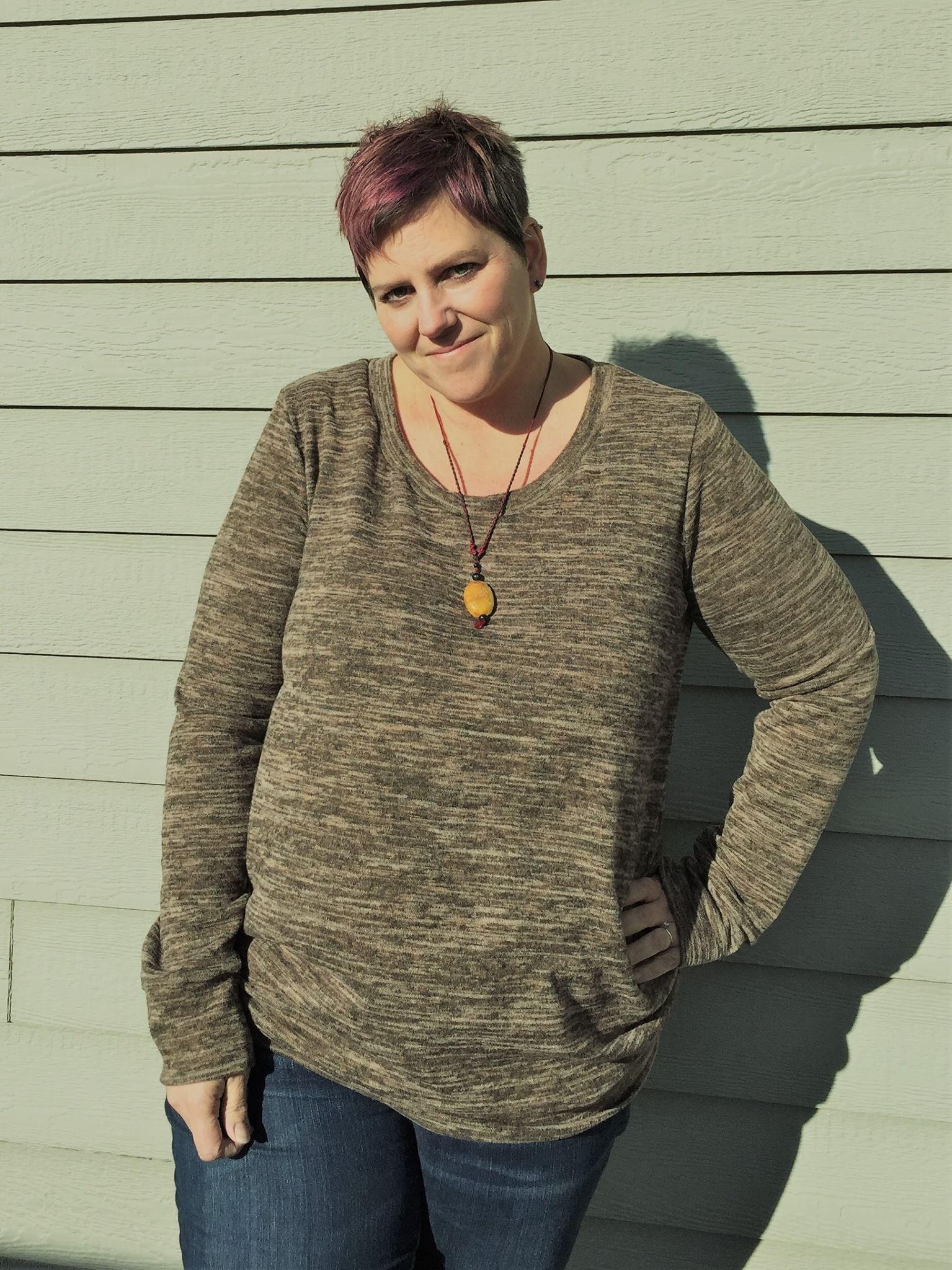 The Nora sweater with long sleeves, scoop neck, and banded hem. Plus size. 
