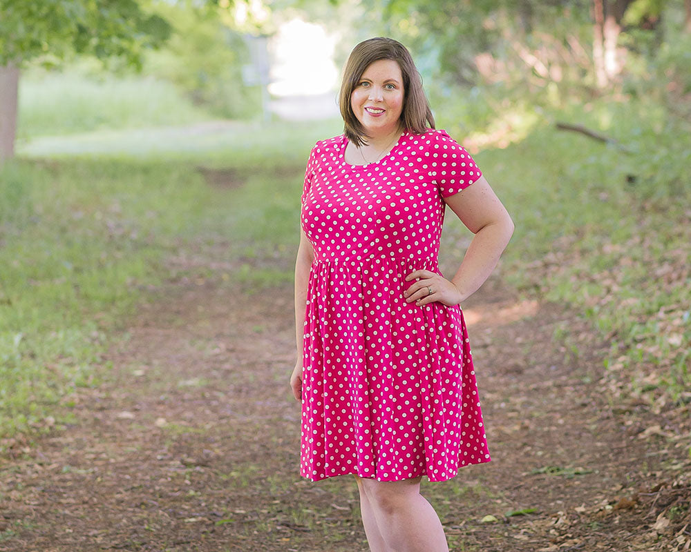 Plus size Emmeline featuring short sleeves and knee length skirt. 