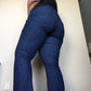 Back view of jeans showing bootleg and topstitching