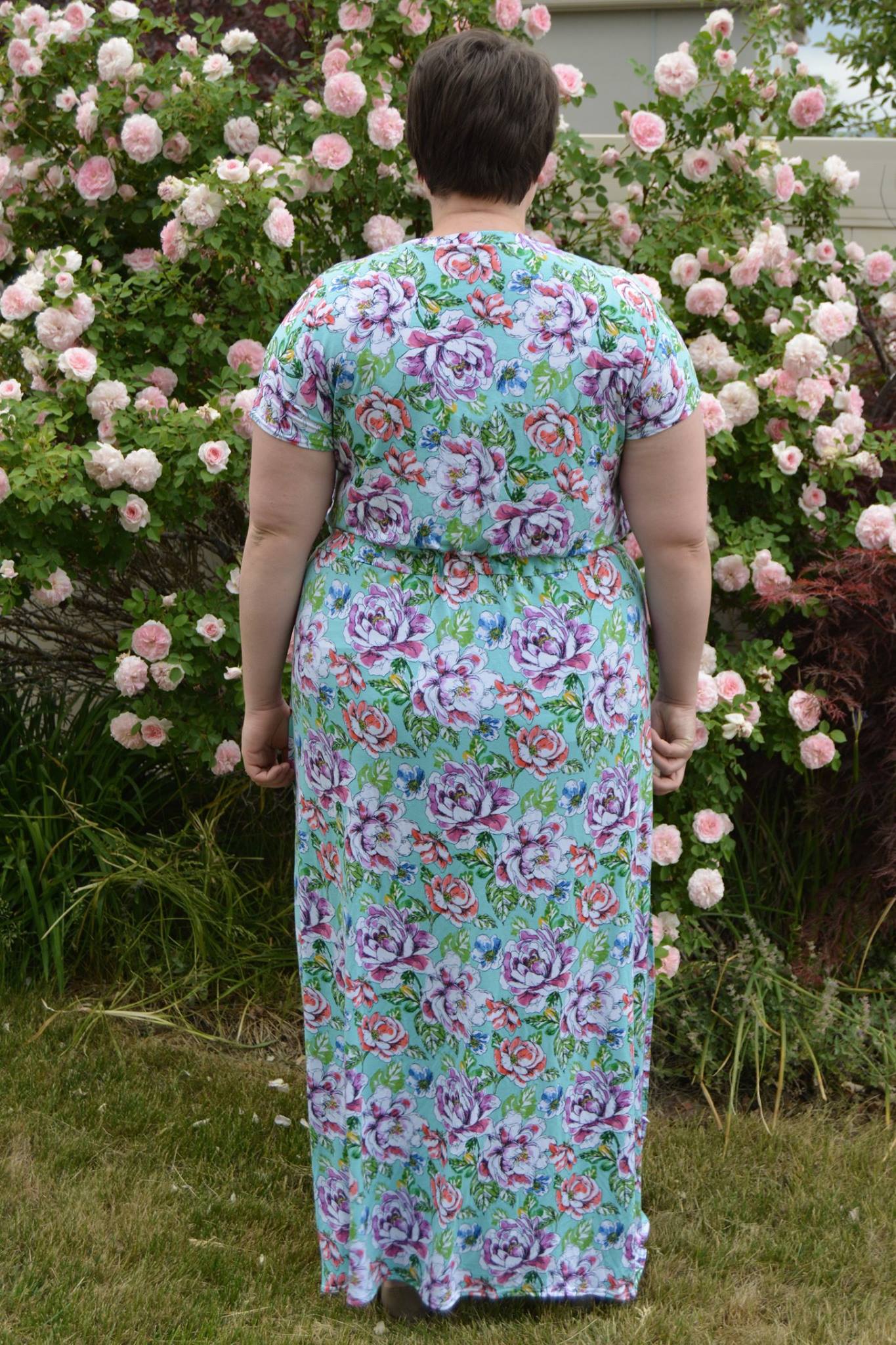 Back view of the Helen dress in plus size. Features a maxi-length skirt option. 