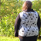 Back view of The Melissa Sweatshirt in plus size. Features a hood and banded hem. 