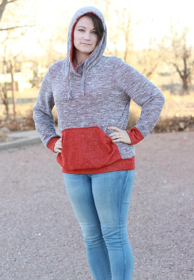 The Melissa Sweatshirt in misses size. Features a hood, kangaroo pocket, and banded hem. 