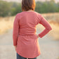 Back view of the Rosa in misses. Features long sleeves and shirt-length options. 