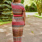 Back view of the Rosa. Features short sleeves and maxi-length skirt options. 