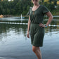 Stevie jumpsuit in an olive green color with short sleeves and shorts pattern options. Misses size. 